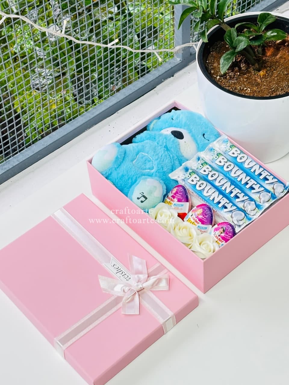 Cute Breathing Teddy Gift Hamper with Bounty Chocolates & Kinder Joy