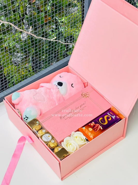 Cute Breathing Teddy Gift Hamper with Premium Chocolates & Floral Touch